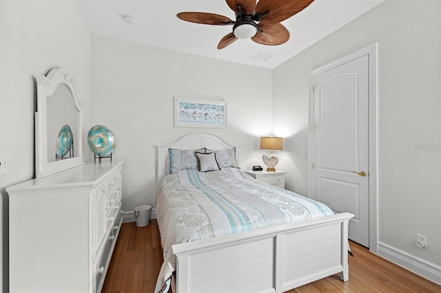 bedroom featuring ceiling fan and light hardwood / wood-style floors