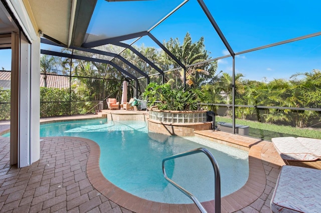 view of pool featuring a lanai and a patio