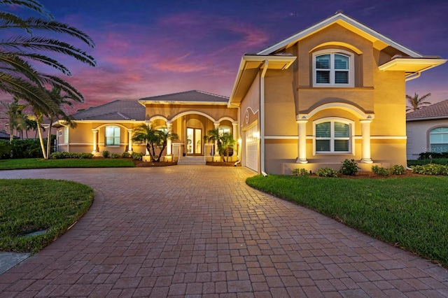 view of front of home with a yard