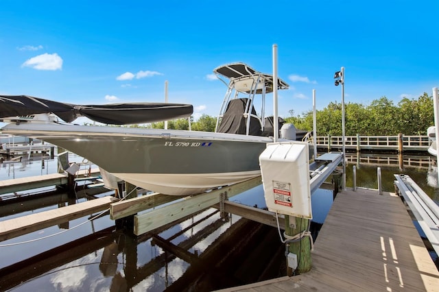 view of dock featuring boat lift