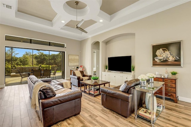 living room featuring coffered ceiling, light hardwood / wood-style flooring, ceiling fan, and a high ceiling