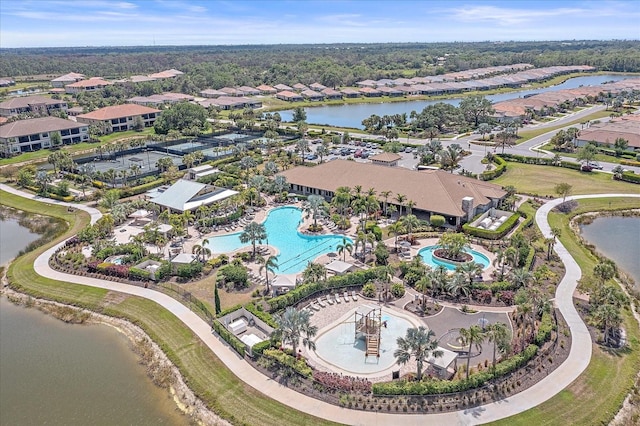 bird's eye view with a water view