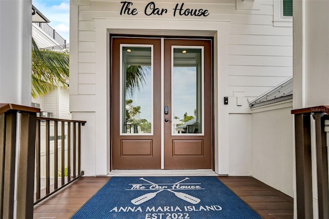 entrance to property featuring french doors