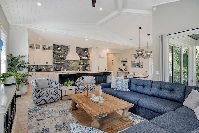 living room with wood ceiling, light hardwood / wood-style flooring, and vaulted ceiling with beams