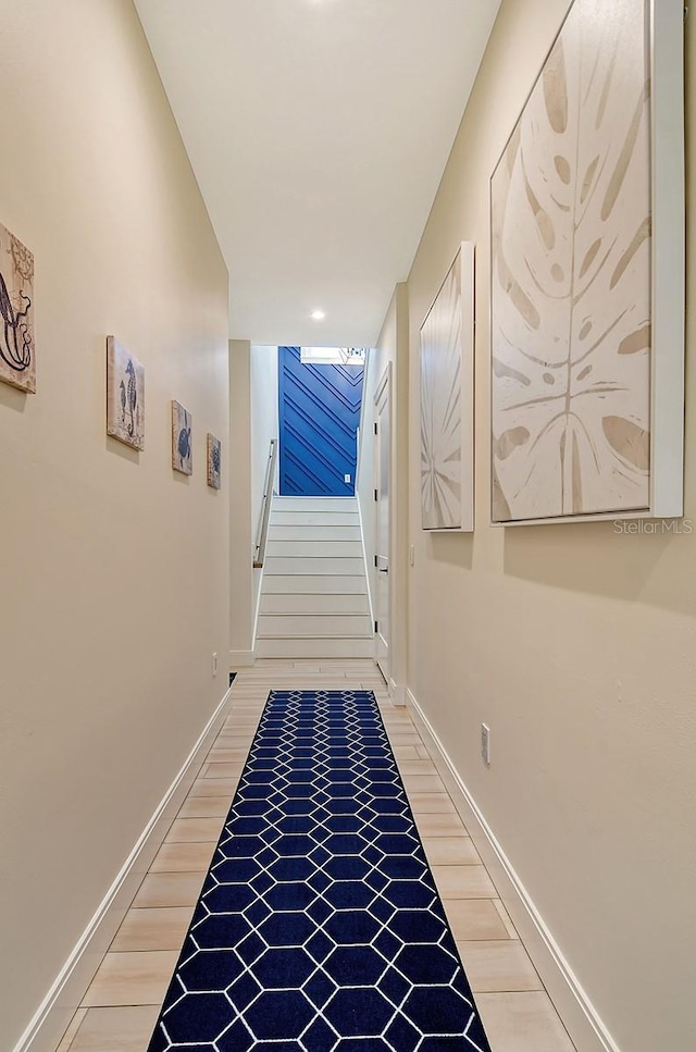 hallway featuring hardwood / wood-style flooring