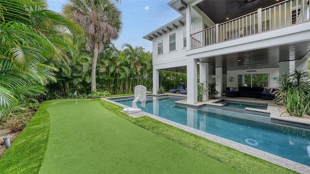 view of swimming pool featuring an in ground hot tub and a patio area