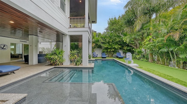 view of pool with a patio area