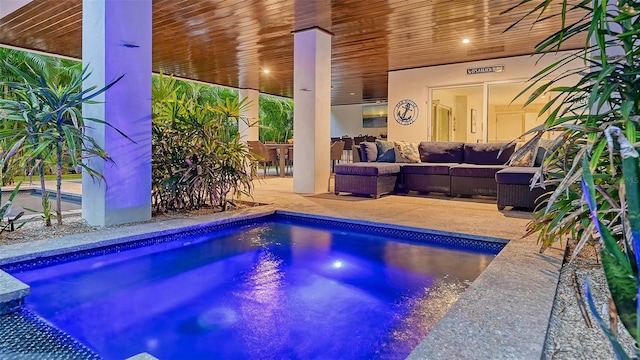 view of pool featuring an outdoor hangout area and a patio area