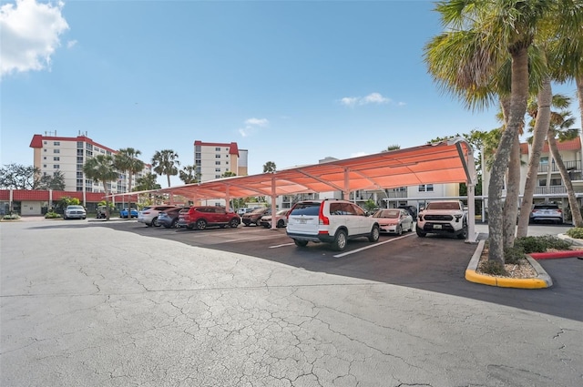 view of partially covered parking lot