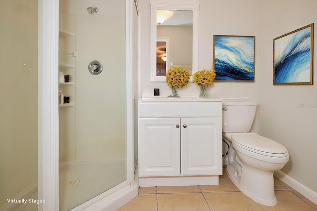 bathroom with vanity, toilet, an enclosed shower, and tile patterned flooring