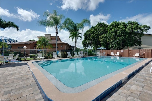 view of swimming pool featuring a patio