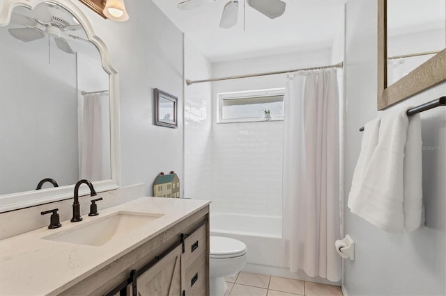 full bathroom featuring toilet, ceiling fan, tile patterned flooring, and vanity