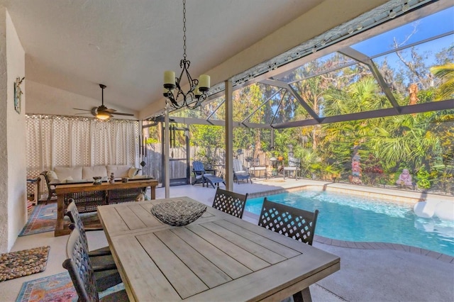 view of pool with outdoor dining area, an outdoor hangout area, a patio area, ceiling fan, and a lanai