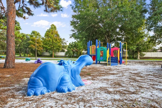 community play area featuring fence