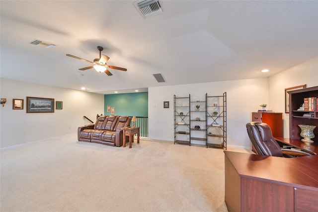 home office with light colored carpet and ceiling fan