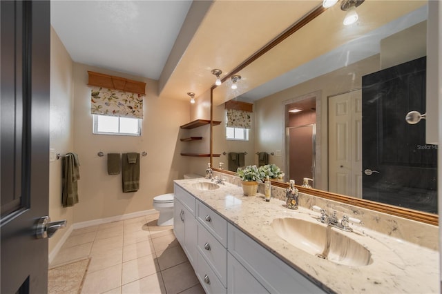 bathroom featuring plenty of natural light, tile patterned floors, toilet, and walk in shower