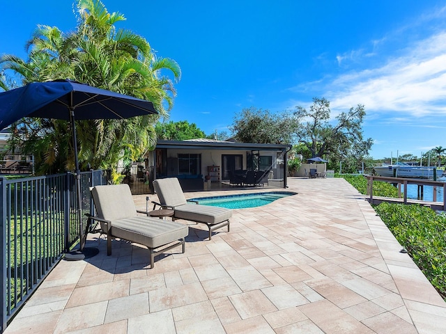 view of pool featuring a patio