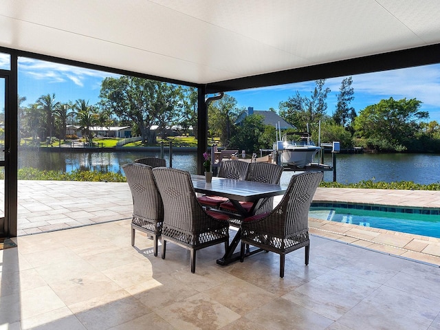 view of patio with a water view