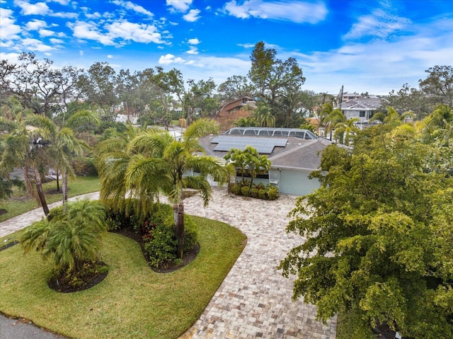 view of community featuring a lawn