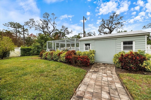 back of property featuring a yard and a lanai