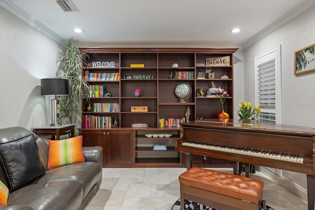 sitting room featuring ornamental molding