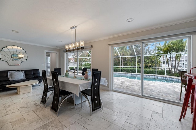 dining space with an inviting chandelier and crown molding