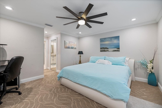 carpeted bedroom featuring ensuite bath, ornamental molding, and ceiling fan