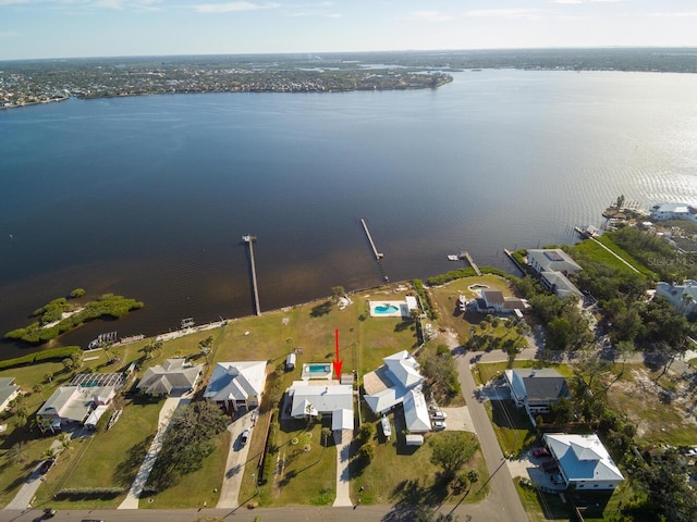 drone / aerial view featuring a water view