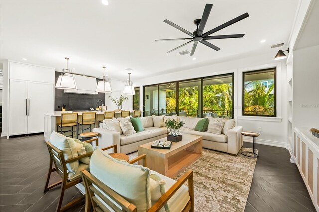 living room featuring ceiling fan