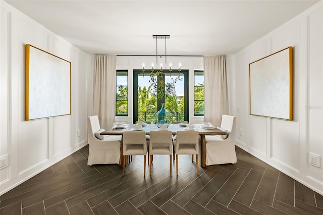 dining room with a chandelier