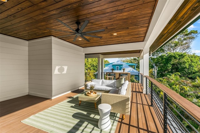 deck with ceiling fan and an outdoor hangout area