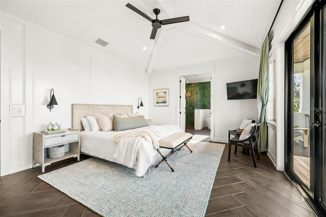 bedroom featuring vaulted ceiling with beams, ensuite bath, and ceiling fan