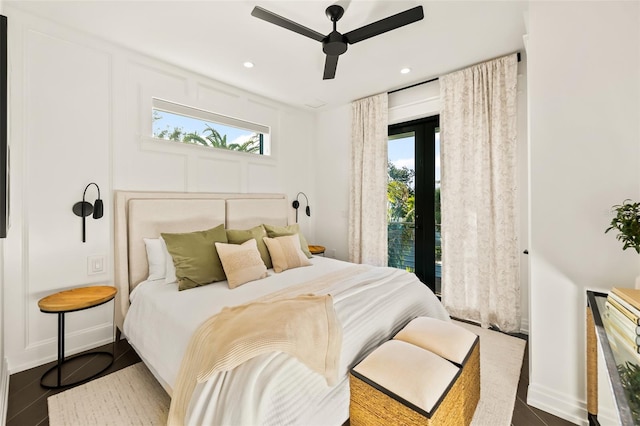 bedroom featuring multiple windows and ceiling fan