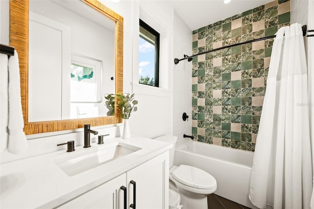 full bathroom featuring vanity, toilet, and shower / bath combo