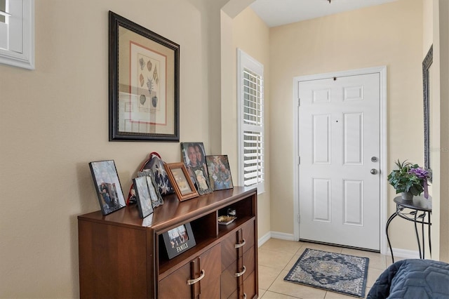 foyer with light tile patterned flooring