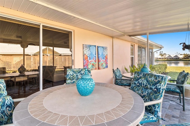 view of patio / terrace featuring a water view