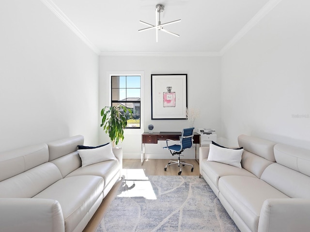 living room with baseboards, ornamental molding, and wood finished floors