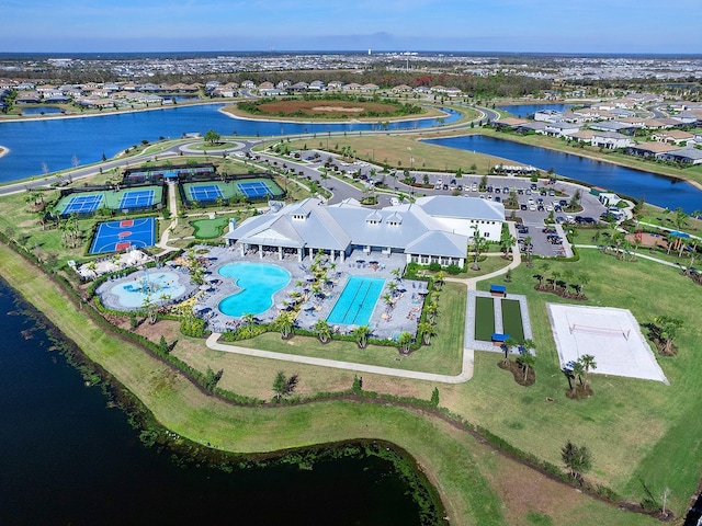 birds eye view of property with a water view