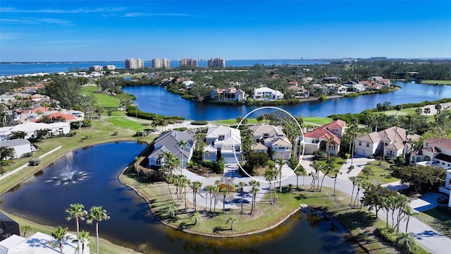 drone / aerial view with a water view