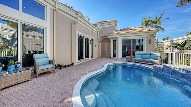 view of pool featuring a patio area