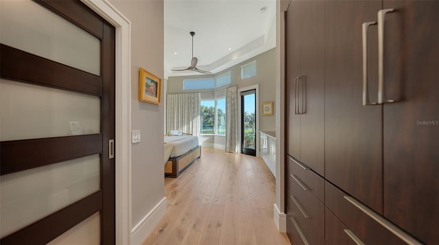 corridor featuring light wood-type flooring