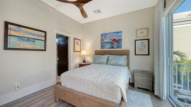 bedroom featuring ceiling fan and light hardwood / wood-style flooring