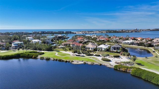 birds eye view of property featuring a water view