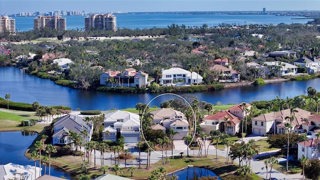 drone / aerial view featuring a water view