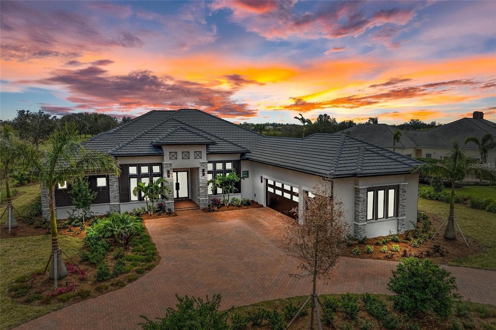 view of front of property featuring a garage