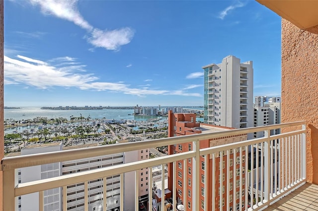 balcony featuring a water view