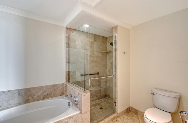 bathroom with tile patterned floors, toilet, and plus walk in shower