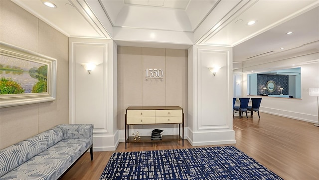 living area with hardwood / wood-style flooring