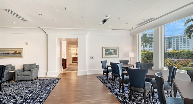 dining space featuring hardwood / wood-style flooring