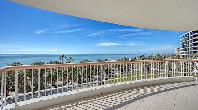 balcony featuring a water view